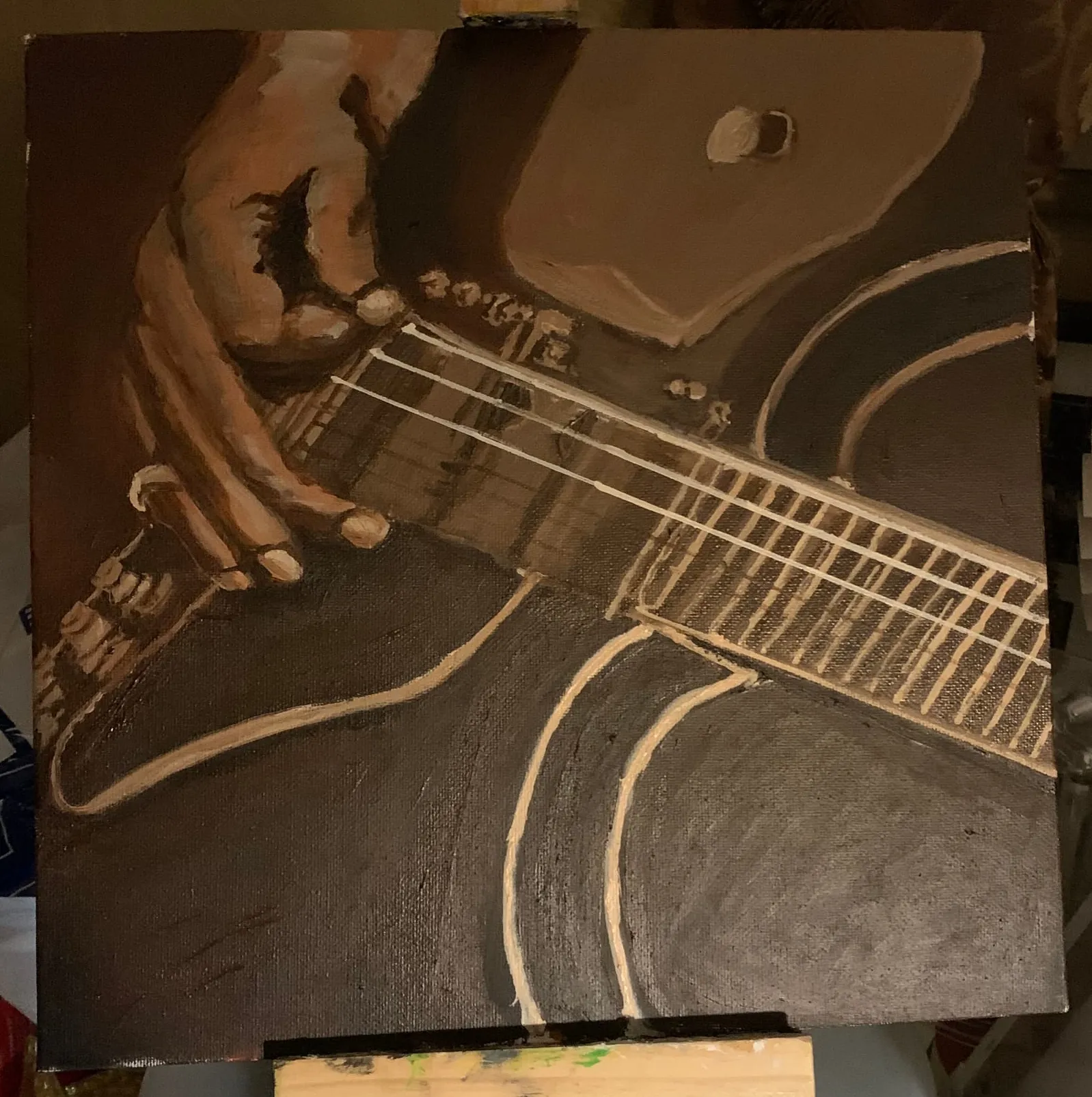 Painting of a hand playing a dark guitar.