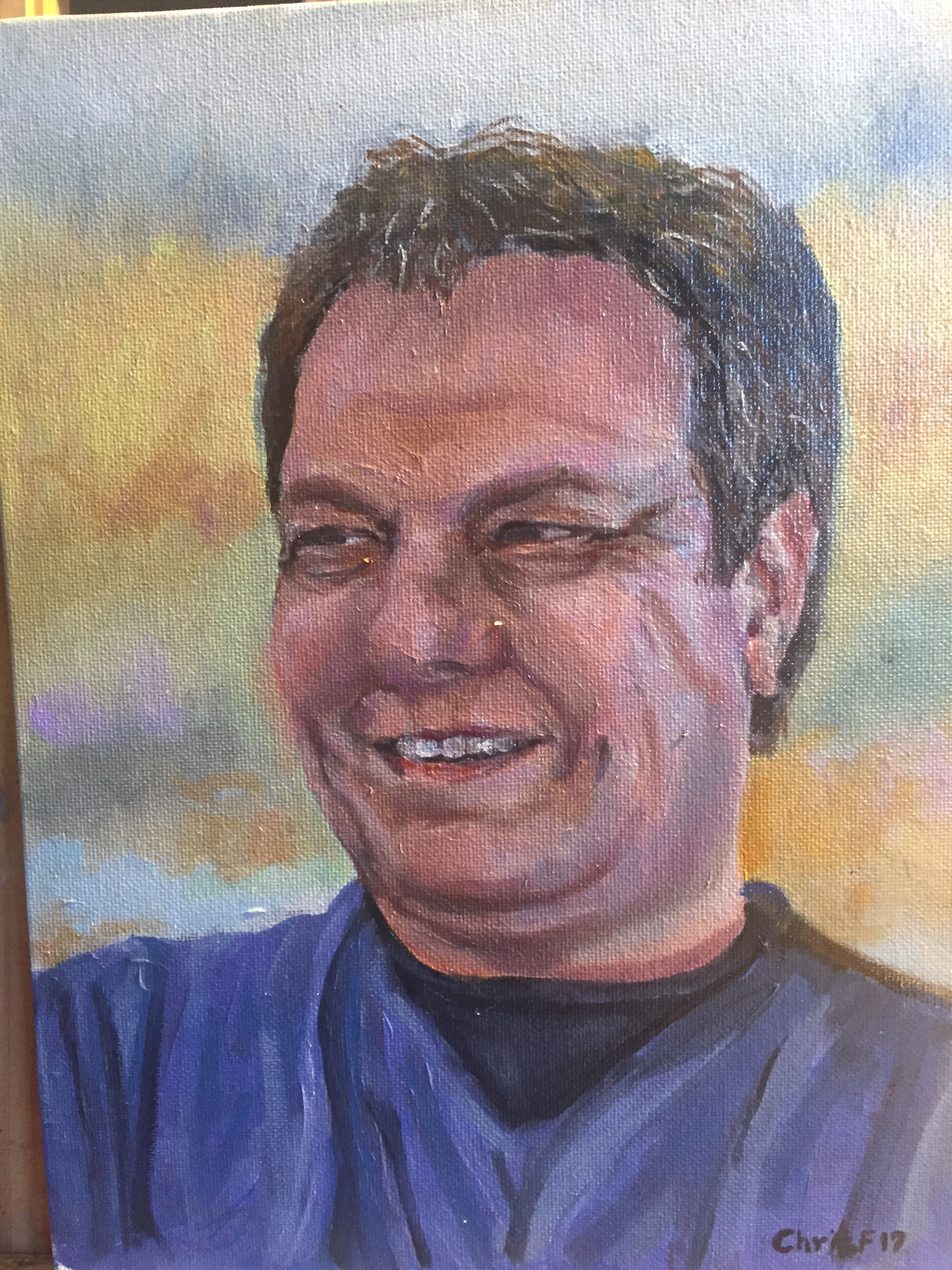 Self-portrait painting of Christopher wearing a purple shirt.