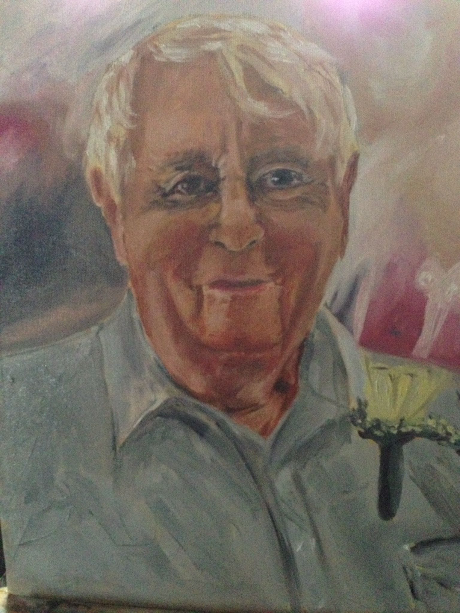 Portrait painting of an older man in a light shirt with a flower at his chest.