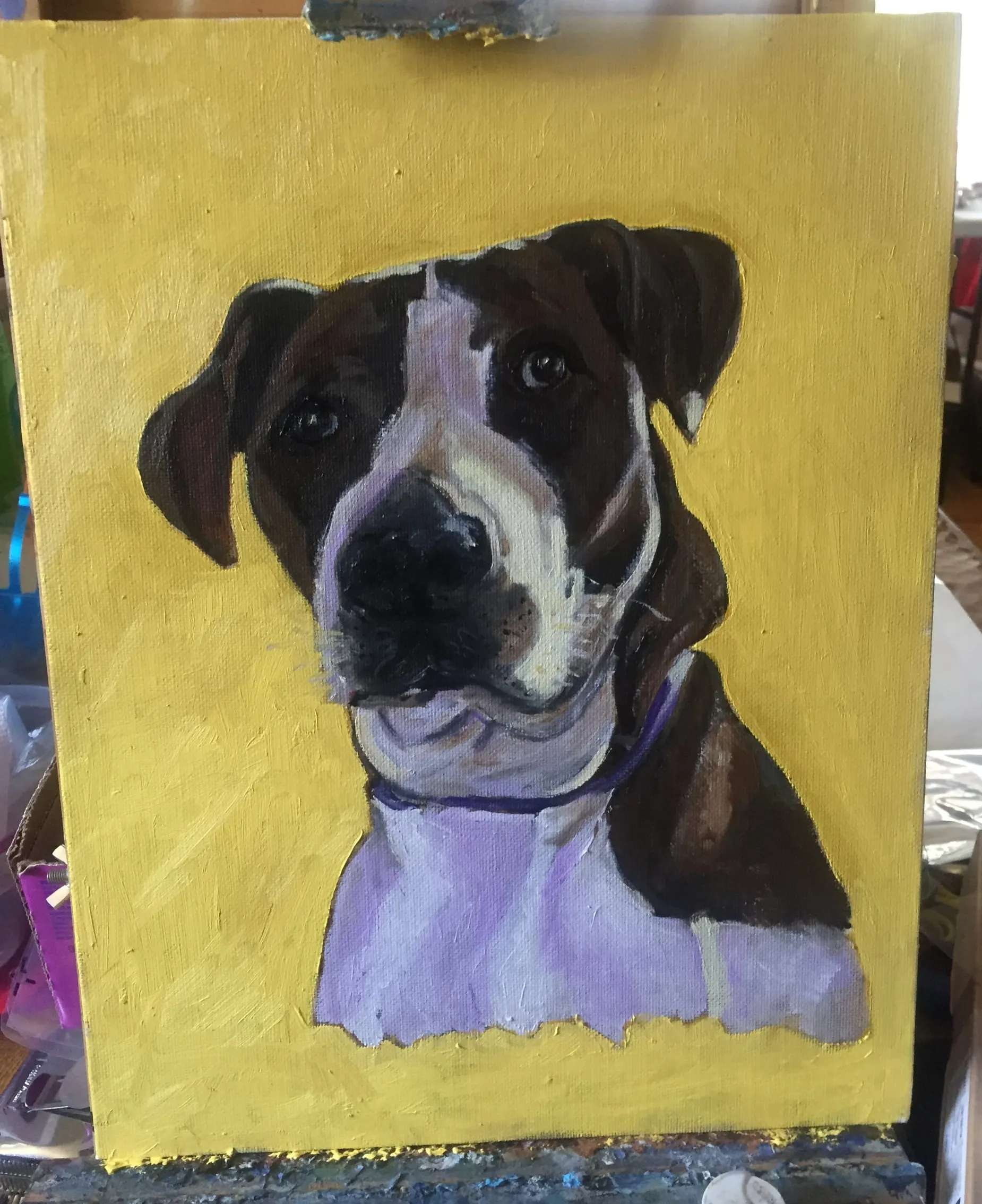 Portrait painting of a dark-and-white dog against a yellow background.