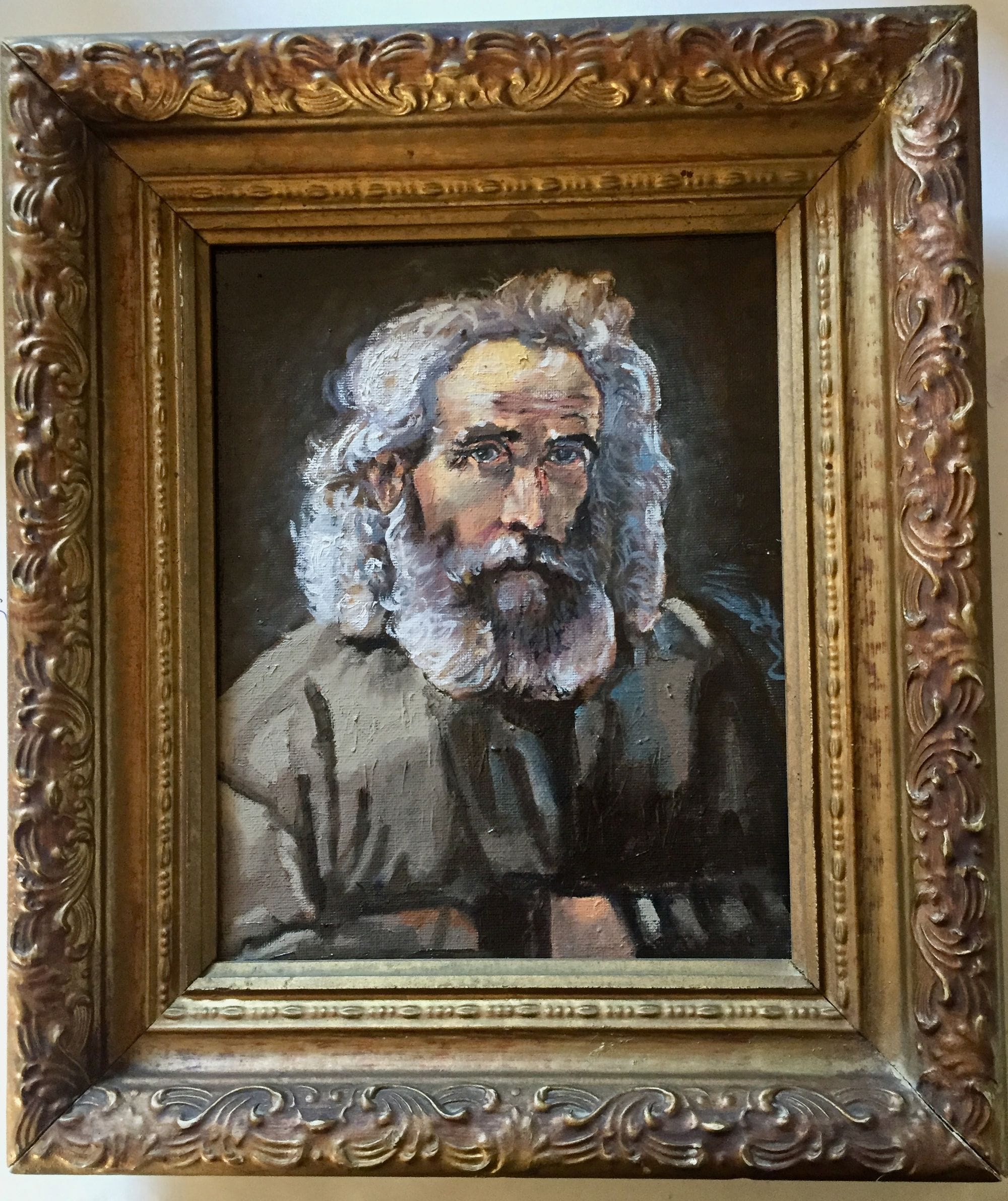 Framed portrait study of a white-bearded man with curly grey hair.