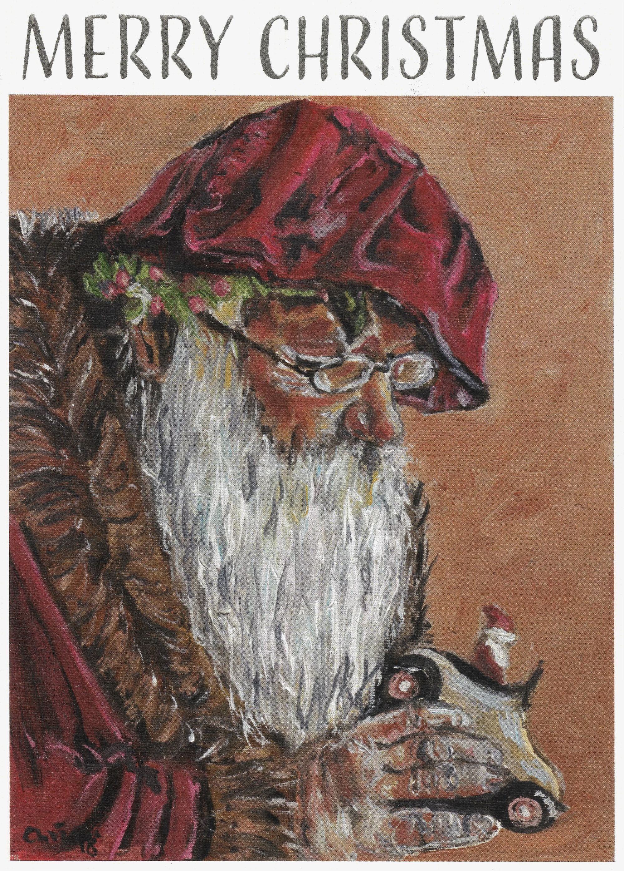 Christmas card design showing a bearded Santa working on a small toy beneath Merry Christmas lettering.