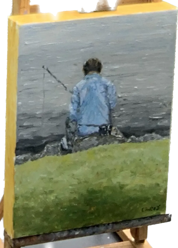 Painting of a seated fisherman seen from behind beside the water, shown on a small easel.