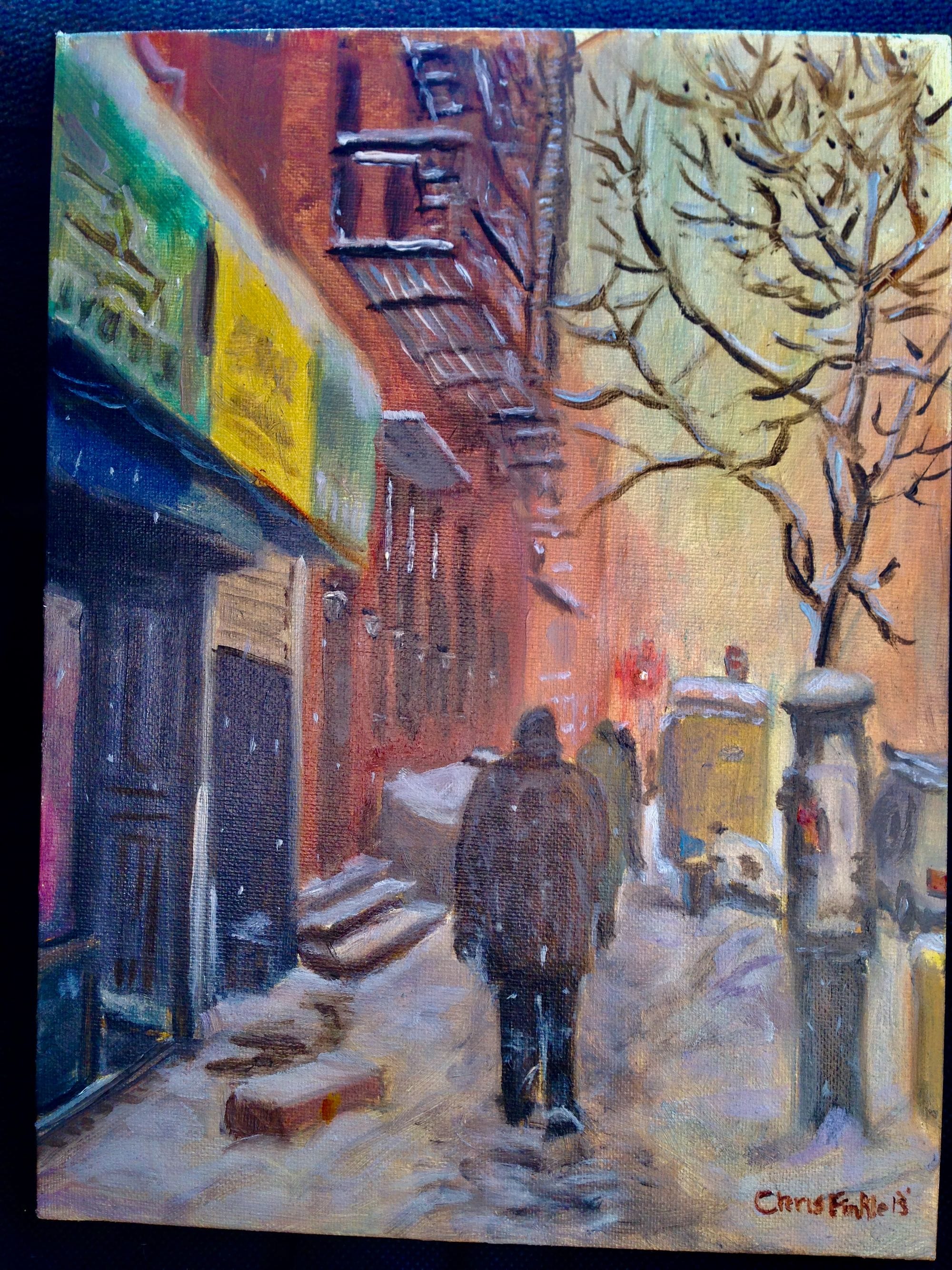 Painting of a person walking along a snowy city street lined with brick buildings.