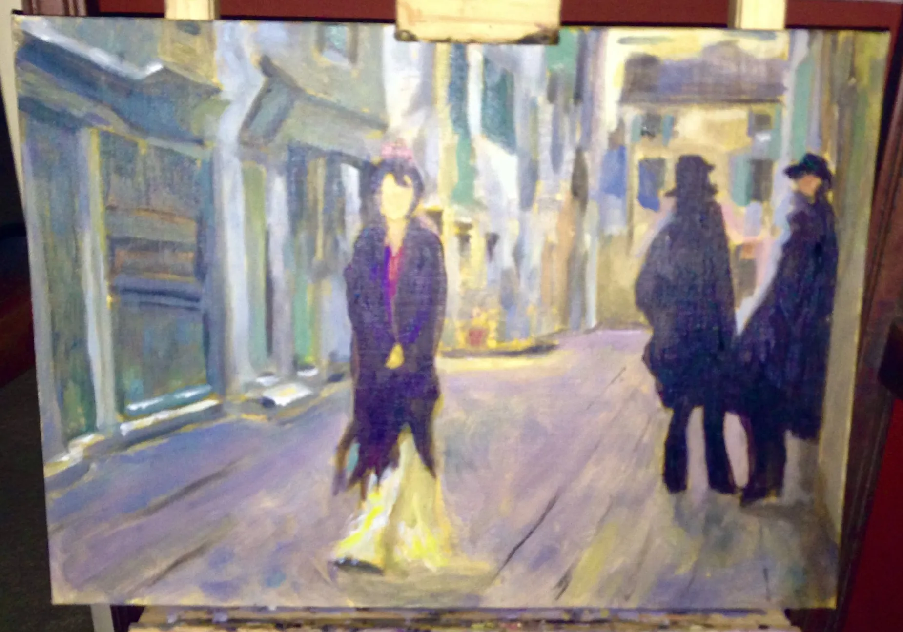 Painting study of figures on a sunlit street.