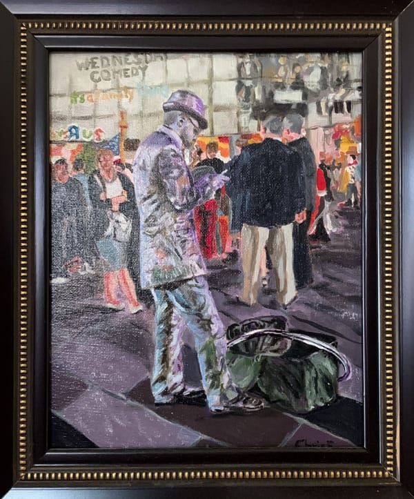 Framed painting of a silver-costumed street performer taking a smoking break in Times Square.
